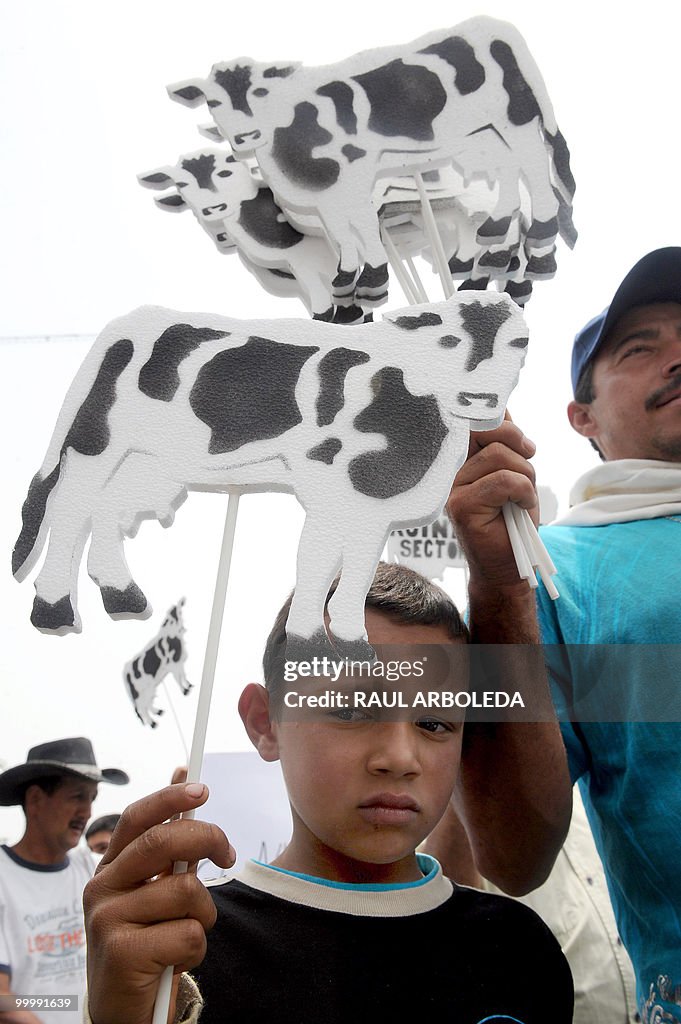 Dairy farmers demonstrate on May 19, 201