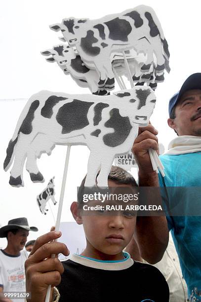 Dairy farmers demonstrate on May 19, 2010 in Medellin, Antioquia department, Colombia, against a free trade agreement signed with the European Union...