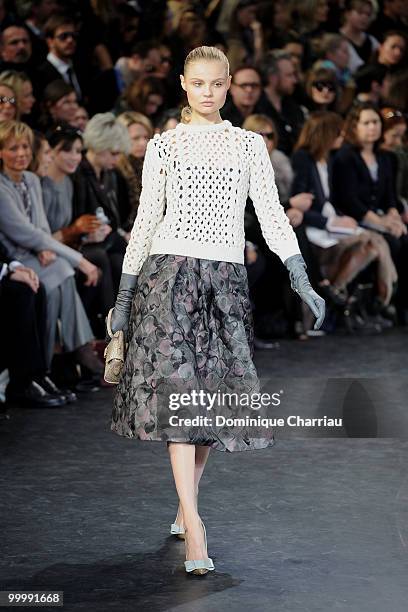 Model walks the runway during the Louis Vuitton Ready to Wear show as part of the Paris Womenswear Fashion Week Fall/Winter 2011 at Cour Carree du...