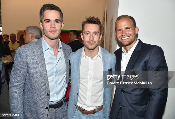 Richard James, Peter Hext and Zev Eisenberg attend the Parrish Art Museum Midsummer Party 2018 at Parrish Art Museum on July 14, 2018 in Water Mill,...