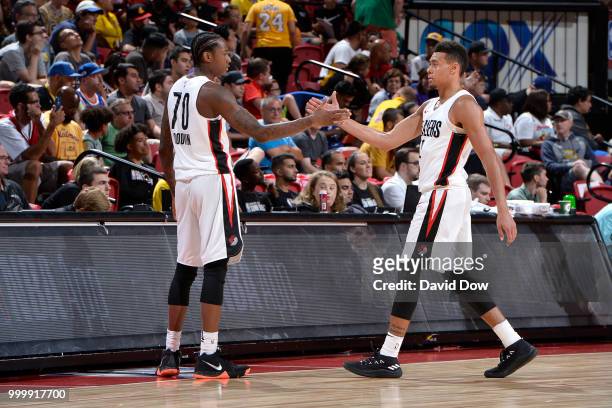 Archie Goodwin and Wade Baldwin IV of the Portland Trail Blazers high five during the game against the Boston Celtics during the 2018 Las Vegas...