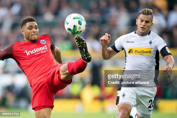 Frankfurt's Simon Falette and Gladbach's Raul Bobadilla in action during the Bundesliga soccer match between Borussia Moenchengladbach and Eintracht...