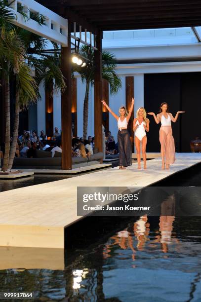 Models walk the runway for Fashion Palette Miami Australian Swim Show SS19 at The Setai Miami Beach on July 15, 2018 in Miami Beach, Florida.