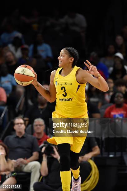 Candace Parker of the Los Angeles Sparks handles the ball against the Las Vegas Aces on July 15, 2018 at the Mandalay Bay Events Center in Las Vegas,...