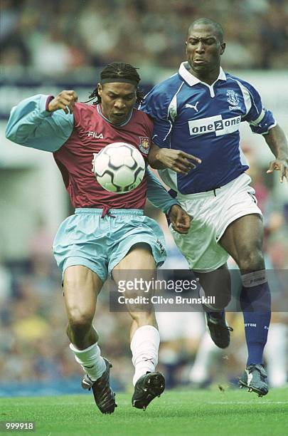 Rigobert Song of West Ham holds off Kevin Campbell of Everton during the match between Everton and West Ham United in the FA Barclaycard Premiership...