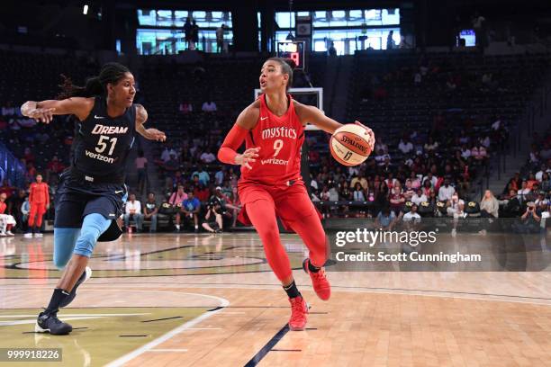 Natasha Cloud of the Washington Mystics handles the ball against the Atlanta Dream on July 15, 2018 at Hank McCamish Pavilion in Atlanta, Georgia....