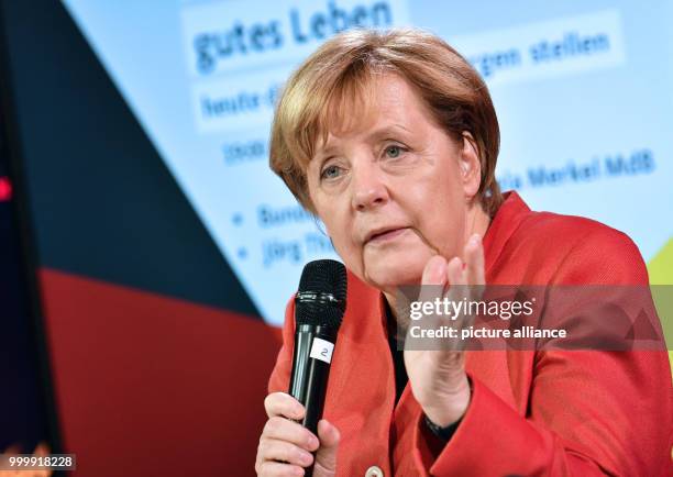 German Chancellor Angela Merkel speaks at the 'Tag der CDU im #fedidwgugl Haus' event in Berlin, Germany, 9 September 2017. Photo: Paul Zinken/dpa