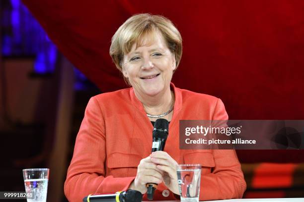 German Chancellor Angela Merkel speaks at the 'Tag der CDU im #fedidwgugl Haus' event in Berlin, Germany, 9 September 2017. Photo: Paul Zinken/dpa