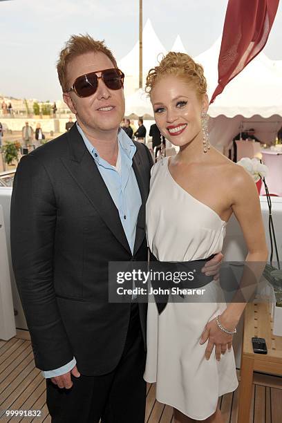 Producer Ryan Kavanaugh and Britta Lazenga attend the "Art of Elysium Paradis Dinner and Party" at Michael Saylor's Yacht, Slip S05 during the 63rd...