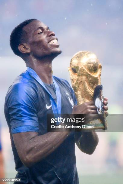 Paul Pogba of France celebrates with the trophy during the World Cup Final match between France and Croatia at Luzhniki Stadium on July 15, 2018 in...