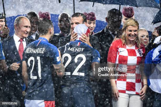 Russian President Valdimir Putin, French President Emmanuel Macron and Croatia's President Kolinda Grabar Kitarovic With Lucas Hernandez and Benjamin...