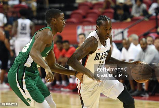Archie Goodwin of the Portland Trail Blazers drives against Daniel Dixon of the Boston Celtics during a quarterfinal game of the 2018 NBA Summer...
