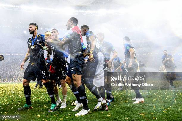 Team of France celebrate the victory with the trophy during the World Cup Final match between France and Croatia at Luzhniki Stadium on July 15, 2018...
