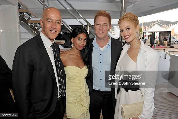 Manny Nunos, guest, Producer Ryan Kavanaugh and Britta Lazenga attend the "Art of Elysium Paradis Dinner and Party" at Michael Saylor's Yacht, Slip...