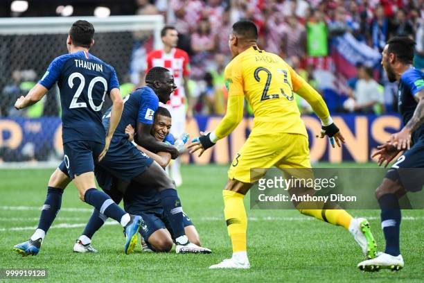 Kylian Mbappe and Benjamin Mendy of France celebrate during the World Cup Final match between France and Croatia at Luzhniki Stadium on July 15, 2018...