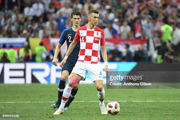 Benjamin Pavard of France and Ivan Perisic of Croatia during the World Cup Final match between France and Croatia at Luzhniki Stadium on July 15,...