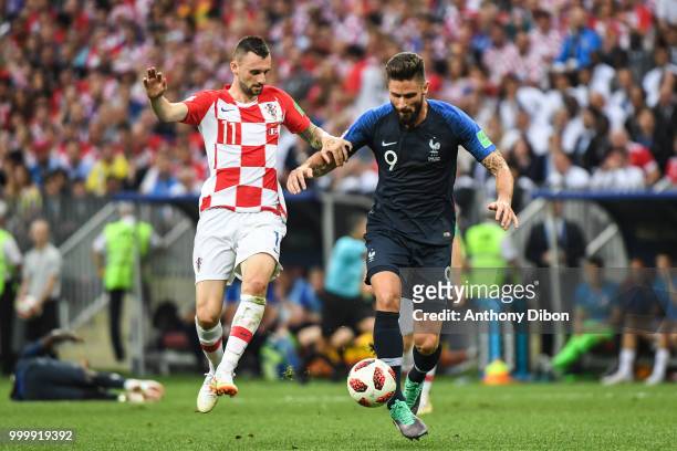 Marcelo Brozovic of Croatia and Olivier Giroud of France during the World Cup Final match between France and Croatia at Luzhniki Stadium on July 15,...