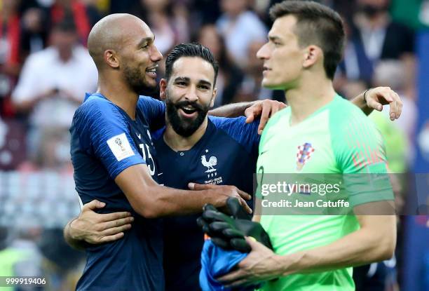 Steven Nzonzi, Adil Rami of France celebrate the victory following the 2018 FIFA World Cup Russia Final between France and Croatia at Luzhniki...