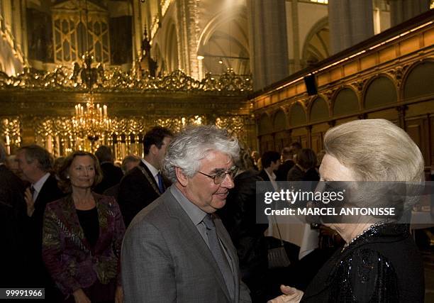 Dutch Queen Beatrix chats with Dutch author Geert Mak in the New Church in Dam square, on May 19, 2010 in Amsterdam. The queen attended a...