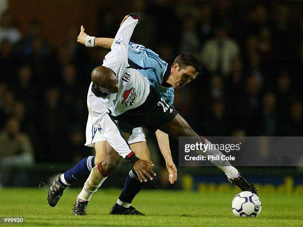 Luis Boa Morte of Fulham under pressure from Oyvind Leonhardsen of Spurs during the Worthington Cup, 4th Round between Fulham and Tottenham Hotspur...