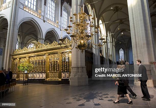 Dutch Queen Beatrix arrives foolowed by temporary local mayor Lodewijk Asscher , in the New Church in Dam square in Amsterdam, on May 19, 2010. The...