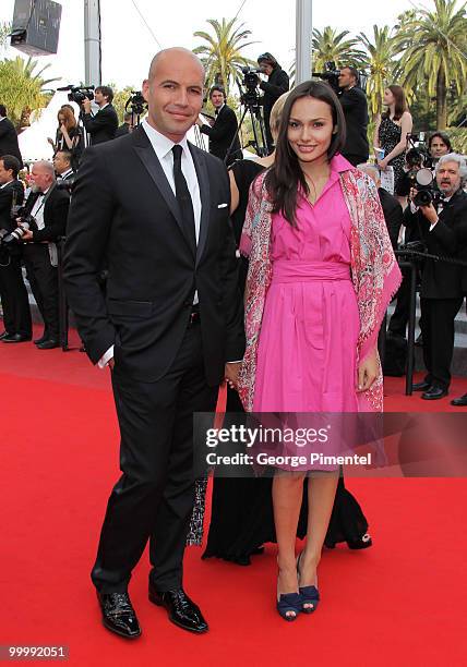 Actor Billy Zane and guest attend the premiere of 'Poetry' held at the Palais des Festivals during the 63rd Annual International Cannes Film Festival...