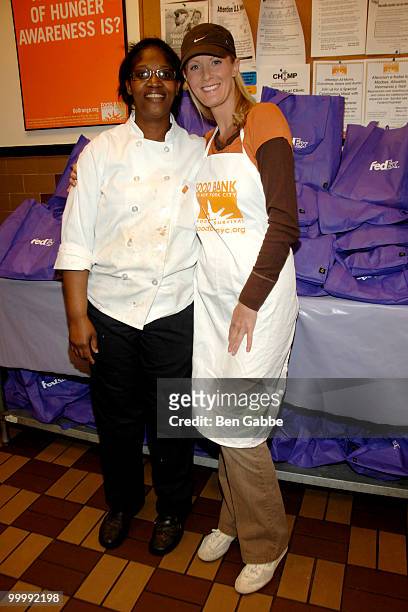 Chef Cathy Sturry and Sandra Lee pose at the Food Bank for New York City's Community Kitchen of West Harlem in celebration of 'Ladies Day' on May 19,...