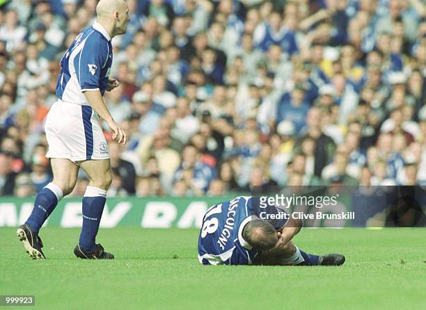 Paul Gascoigne of Everton is injured during the match between Everton and West Ham United in the FA Barclaycard Premiership at Goodison Park,...