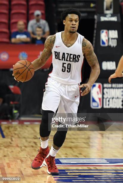 McDaniels of the Portland Trail Blazers brings the ball up the court against the Boston Celtics during a quarterfinal game of the 2018 NBA Summer...