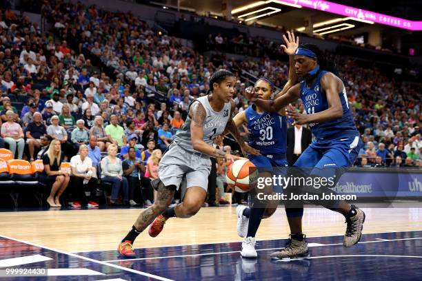 Tamera Young of the Las Vegas Aces handles the ball during the game against the Minnesota Lynx on July 13, 2018 at Target Center in Minneapolis,...