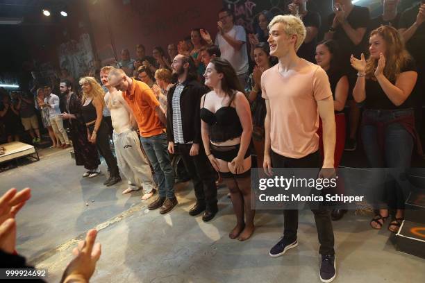 Cast members Tom Chandler, Greg Esplin, Andrew Barrett, Tariq Malik, Pia Hagen, Lauren Downie and Olivier Sublet take a bow during the curtain call...