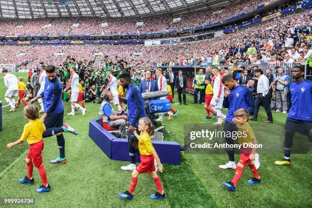 Olivier Giroud, Samuel Umtiti, Kylian Mbappe and Paul Pogba of France enters on the pitch during the World Cup Final match between France and Croatia...