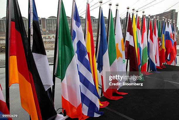 Flags for the European Union members stand during a ceremony to lay a cornerstone for the new European Central Bank headquarters in Frankfurt,...