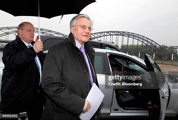 Jean-Claude Trichet, president of the European Central Bank , center, arrives for a ceremony to lay the cornerstone for the new ECB headquarters in...