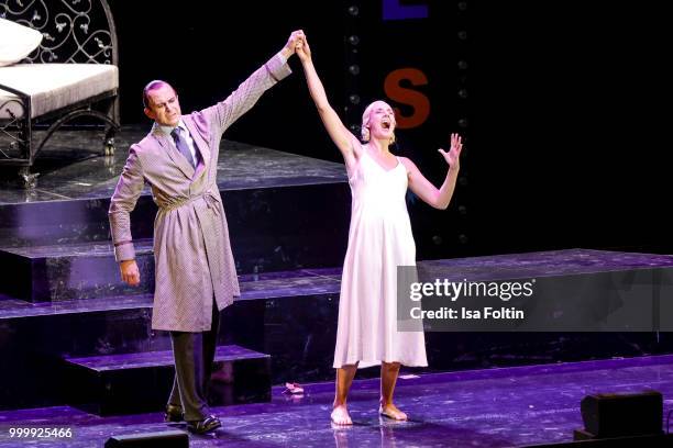 Mark Weigel as Peron and Bettina Moench as Evita during the Thurn & Taxis Castle Festival 2018 - 'Evita' Musical on July 15, 2018 in Regensburg,...