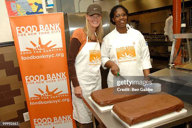 Chef Cathy Sturry and Sandra Lee pose at the Food Bank for New York City's Community Kitchen of West Harlem in celebration of 'Ladies Day' on May 19,...