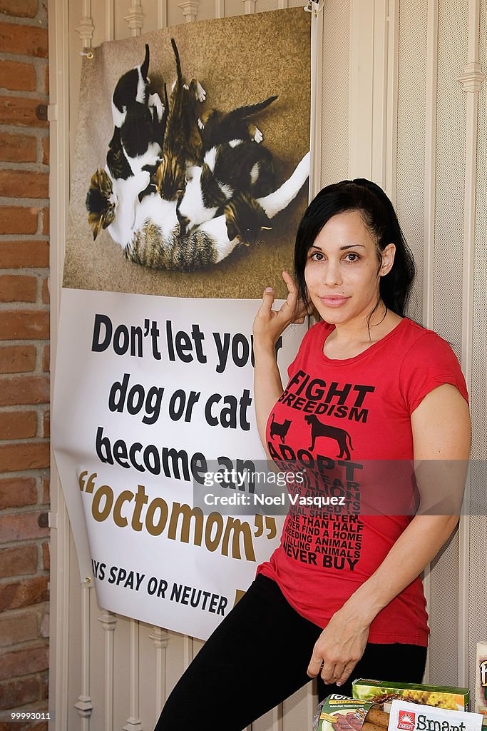 Nadya "Octomom" Suleman Unveil's Banner Pushing Cat And Dog Birth Control