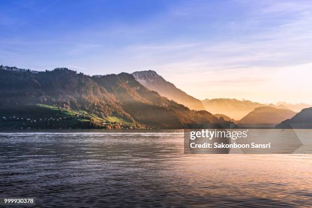 sunset in luzern switzerland - sakonboon stock pictures, royalty-free photos & images