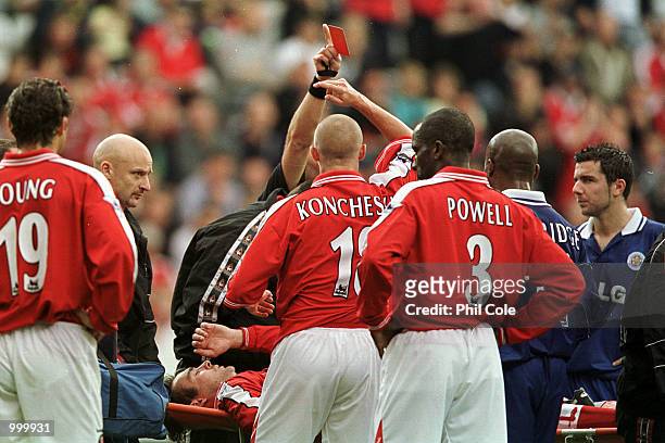 Steve Brown of Charlton is red carded by Referee M Dean as he is carried off the pitch after injuring himself during the FA Barclaycard Premiership...