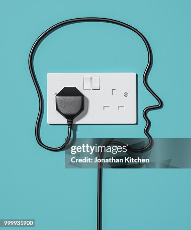 A plug socket with a human face A plug socket with a human face