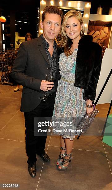 Nick Candy and Holly Vallance attends the instore launch for the opening of TopShop's Knightsbridge store on May 19, 2010 in London, England.