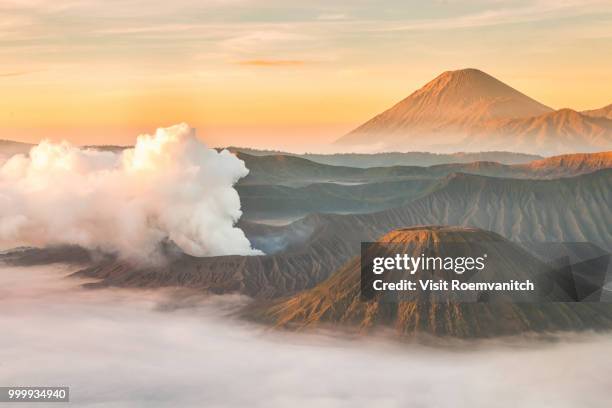 landscape of mount bromo volcano, batok and semeru (mt.) during sunrise from viewpoint on mount... - mt semeru stock-fotos und bilder