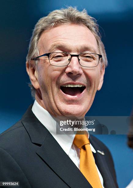 Wolfgang Mayrhuber, chief executive officer of Lufthansa AG, smiles during a ceremony following the arrival of the airlines first Airbus A380...