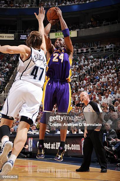 Kobe Bryant of the Los Angeles Lakers shoots a jump shot against Andrei Kirilenko of the Utah Jazz in Game Three of the Western Conference Semifinals...