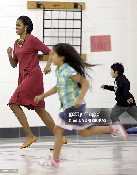 First Lady Michelle Obama First takes part in gym class activities as she and Mexican First Lady Margarita Zavala Calderon visits New Hampshire...