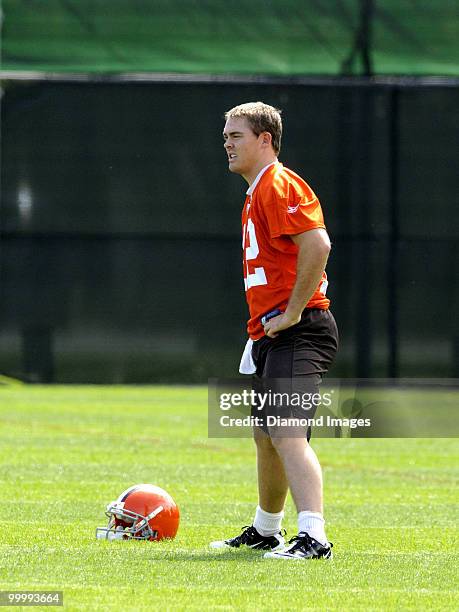 Quarterback Colt McCoy of the Cleveland Browns stretches prior to the team's organized team activity on May 19, 2010 at the Cleveland Browns practice...