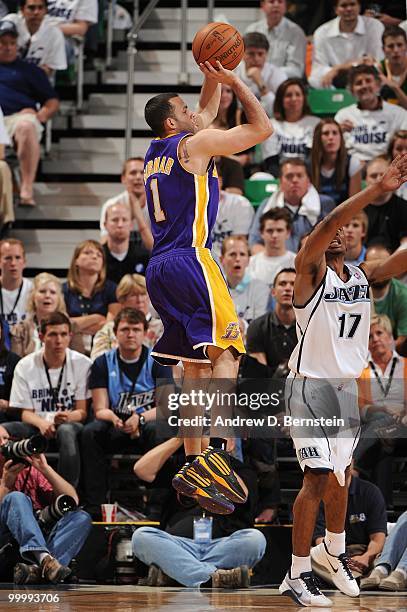 Jordan Farmar of the Los Angeles Lakers shoots a jump shot against Ronnie Price of the Utah Jazz in Game Three of the Western Conference Semifinals...