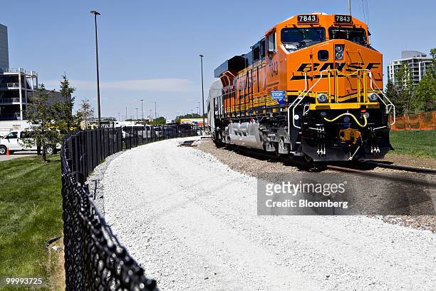 Burlington Northern Safta Fe LLC locomotive sits on display on the sidelines of the Berkshire Hathaway annual meeting in Omaha, Nebraska, U.S., on...
