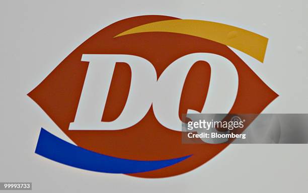 An International Dairy Queen Inc. Logo sits on display on the sidelines of the Berkshire Hathaway annual meeting in Omaha, Nebraska, U.S., on...