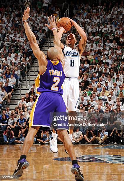 Deron Williams of the Utah Jazz shoots a jump shot against Derek Fisher of the Los Angeles Lakers in Game Three of the Western Conference Semifinals...